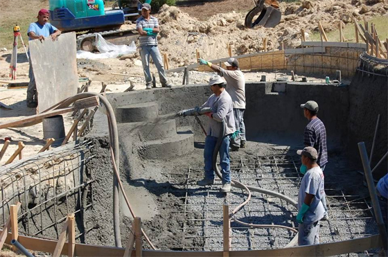 Concrete swimming pool construction